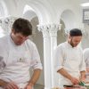 Professional cook school chefs preparing food during cookery course